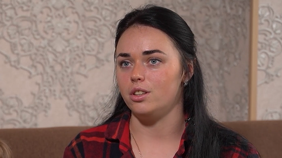 The child is covered in blood, everyone is screaming