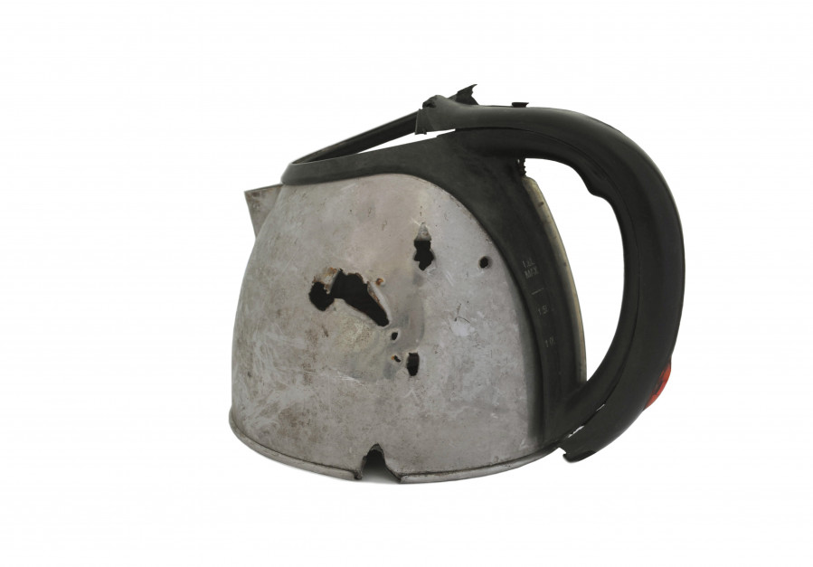 Artifact "A teapot damaged by debris"
